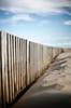 Juliste Sand behind bars