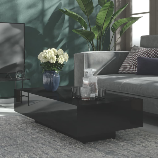 vidaXL Sohvapöytä korkeakiilto musta 115x60x31 cm lastulevy