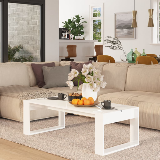 vidaXL Sohvapöytä korkeakiilto valkoinen 110x50x35 cm tekninen puu